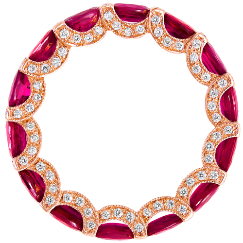 Ruby and diamond eternity ring on white background
