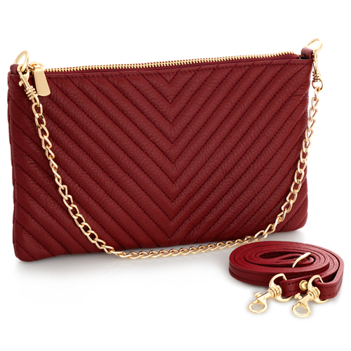 Burgundy quilted crossbody handbag on white background